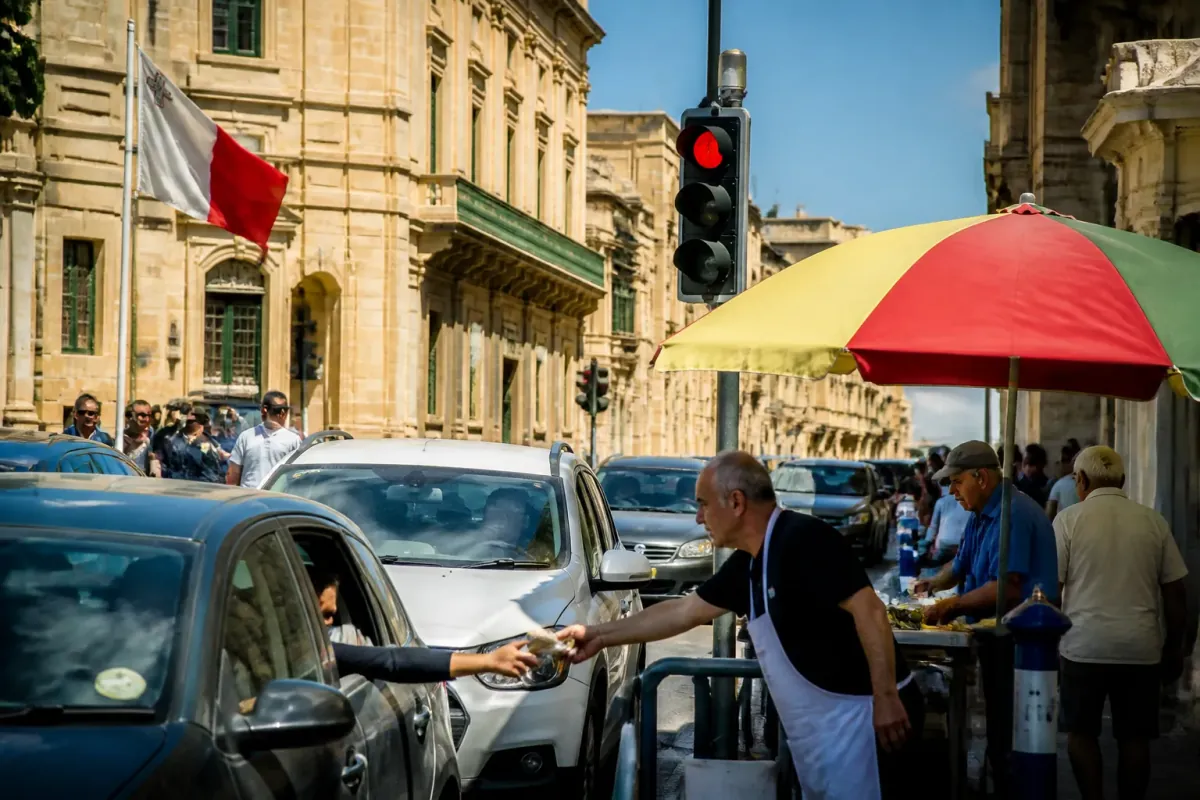Maltese Government Replaces Traffic Lights with Pastizzi Vendors to Combat Road Rage